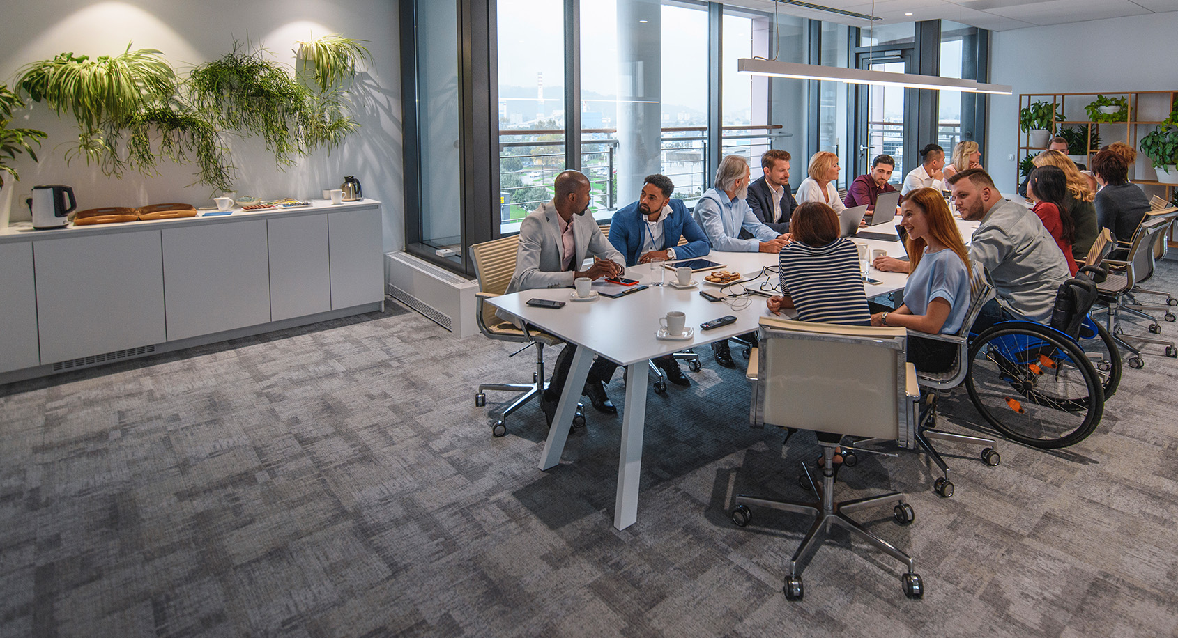 Group of executives around a large conference table