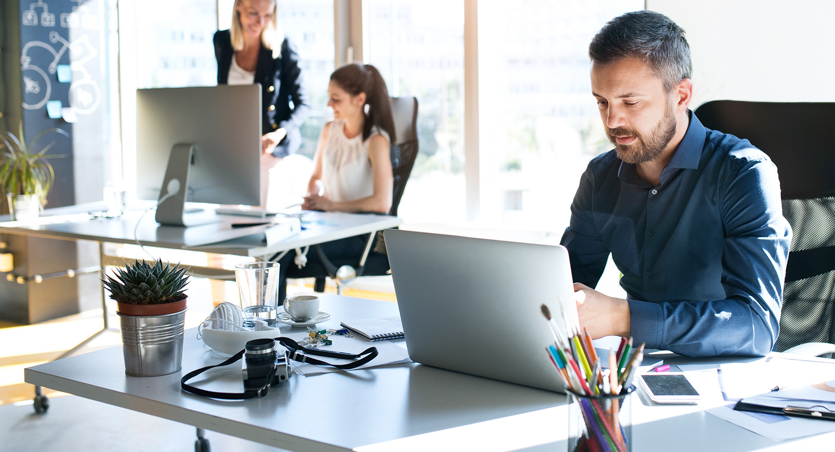 Man on computer at desk